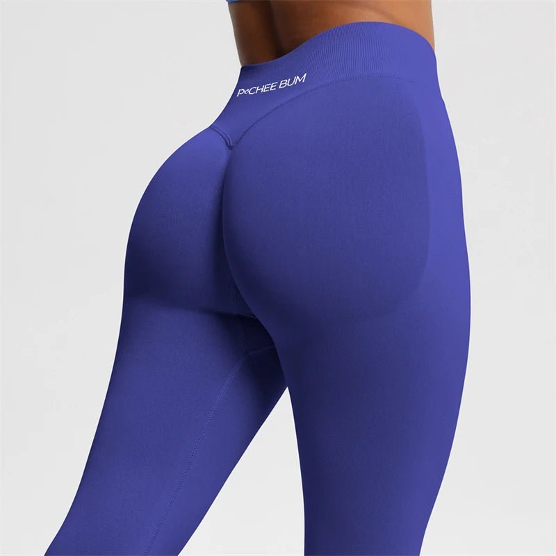 Purple high-waisted leggings with cheeky bum design, form-fitting workout wear for women