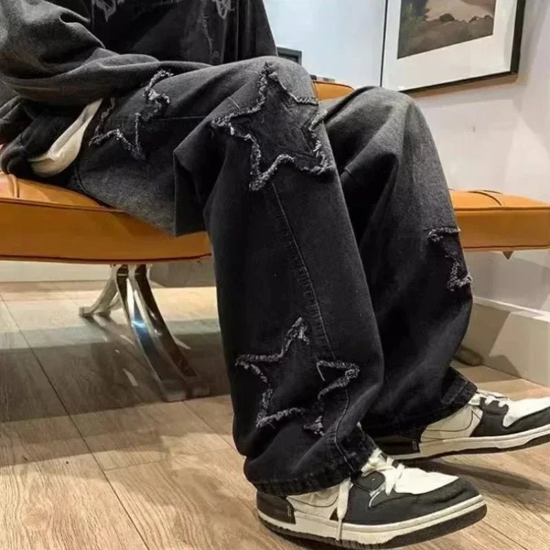 Black ripped star jeans with white sneakers, casual streetwear style