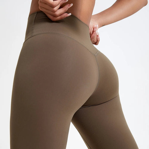 Olive high-waisted leggings for women, form-fitting workout pants with seamless design